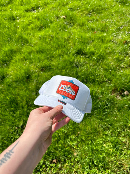 Red Coors Turquoise Trucker hat