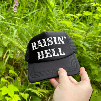 Raisin’ Hell Black trucker hat