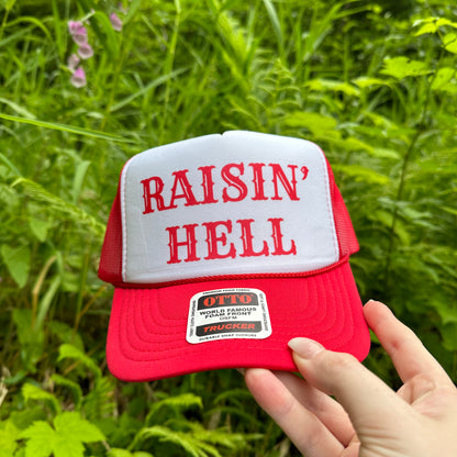 Raisin’ hell red trucker hat